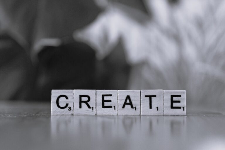 Scrabble tiles spelling the word CREATE